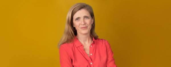  Portrait of Samantha Power in a pinkish-red blouse against a gold background. ©Martha Stewart, 2020