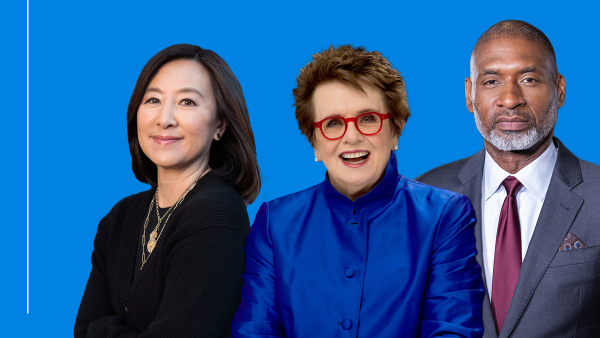 Three people stand confidently against a blue background with the text "Ideas At Ford." The group includes Clara Wu Tsai, in black, Billie Jean King, in a bright blue outfit and red glasses, and Charles Blow, in a suit and red tie.