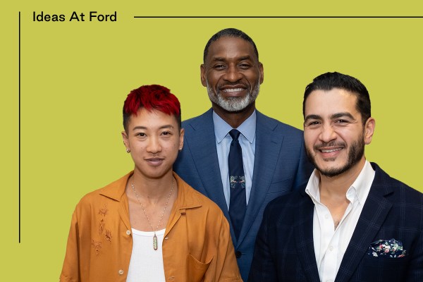 Three people stand in front of a green background with the text "Ideas At Ford" at the top left. The person on the left, Jes Tom, has short hair and is wearing a brown shirt; the middle person, Charles Blow, has a gray-haired beard and is wearing a blue suit with a light blue shirt and dark blue tie; and the person on the right, Dr. Abdul El-Sayed, has a beard and is wearing a dark suit with a white collar shirt.